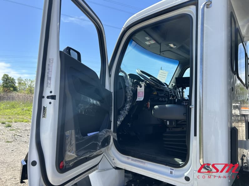 Drivers side door open for this 2025 Kenworth T480 (Stock number: SM177629)