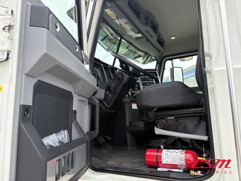 Drivers side door open for this 2027 Mack Pinnacle PI64 (Stock number: VM021599)