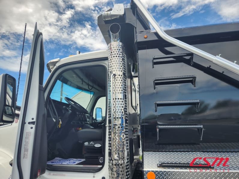 Drivers side door open for this 2026 Kenworth T880 (Stock number: TJ230001)