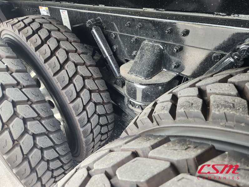 Driver side rear frame and tire tread for this 2026 Kenworth T880 (Stock number: TJ230001)