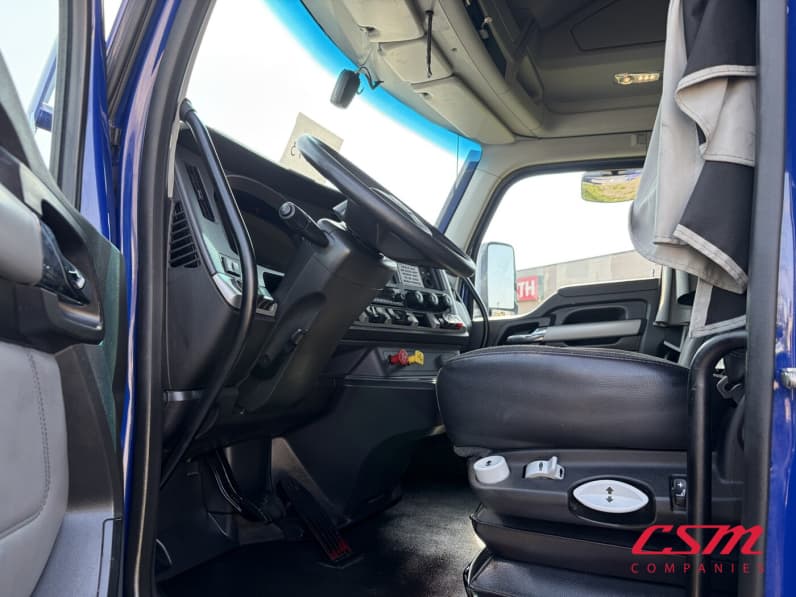 Drivers side door open for this 2023 Kenworth T680 (Stock number: UPJ216901)