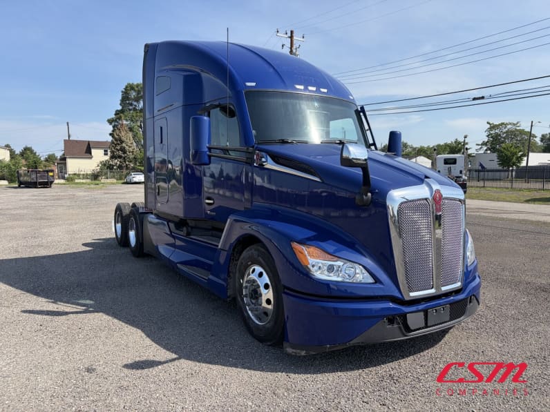 Exterior front passenger side for this 2023 Kenworth T680 (Stock number: UPJ216901)