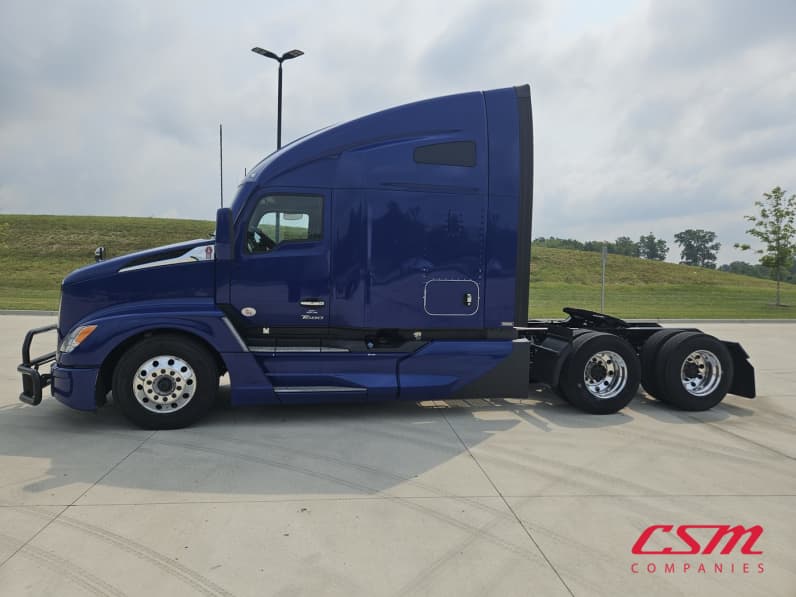 Exterior full driver side for this 2023 Kenworth T680 (Stock number: UPJ216989)