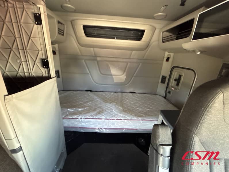 Interior wide sleeper view for this 2023 Peterbilt 579 (Stock number: UPD806287)