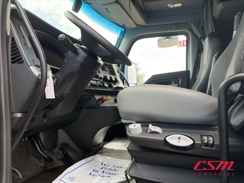 Drivers side door open for this 2023 Kenworth T680 (Stock number: UPJ216940)