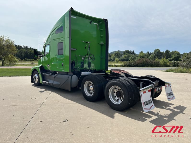 Exterior rear driver side for this 2023 Kenworth T680 (Stock number: UPJ217559)