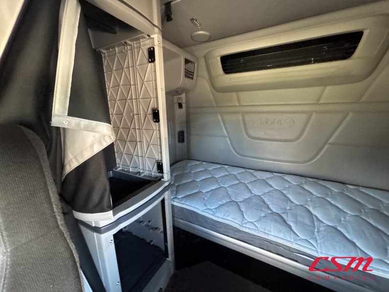 Interior passenger side sleeper for this 2023 Peterbilt 579 (Stock number: UPD806294)