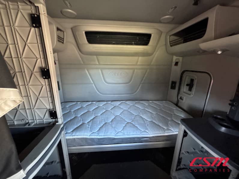 Interior wide sleeper view for this 2023 Peterbilt 579 (Stock number: UPD806294)