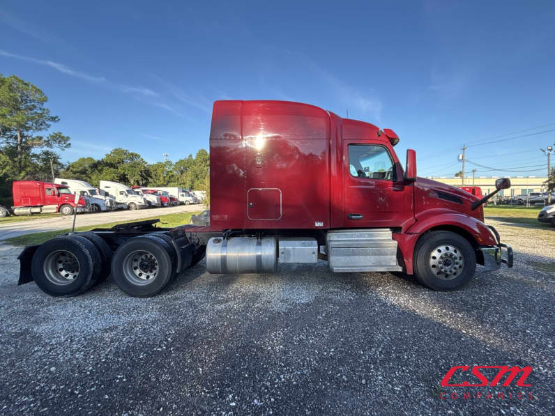 Exterior full passenger side for this 2023 Peterbilt 579 (Stock number: UPD806296)