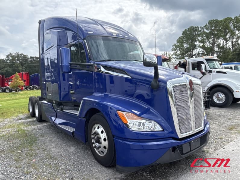 Exterior front passenger side for this 2023 Kenworth T680 (Stock number: UPJ216888)