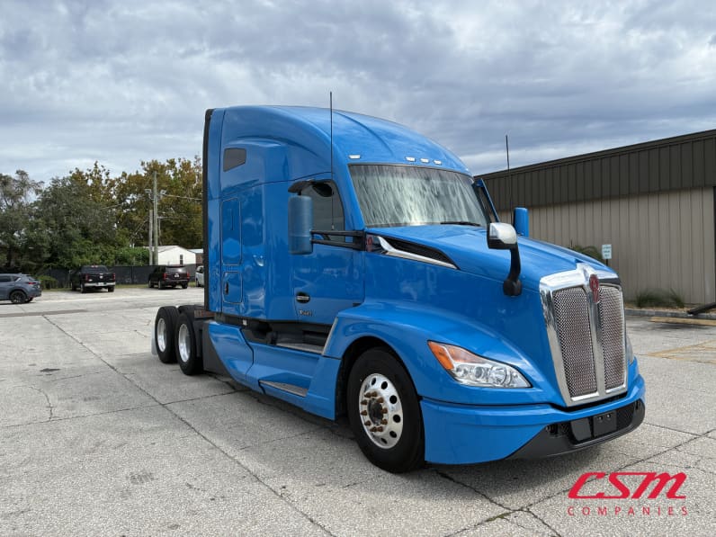 Exterior front passenger side for this 2023 Kenworth T680 (Stock number: UPJ216883)