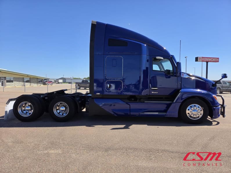 Exterior full passenger side for this 2023 Kenworth T680 (Stock number: UPJ216993)