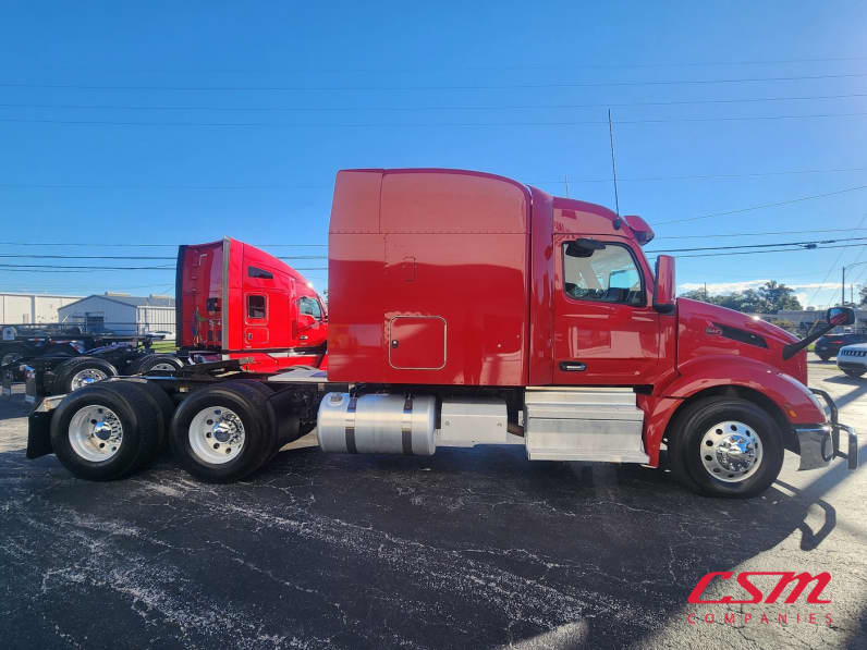 Exterior full passenger side for this 2023 Peterbilt 579 (Stock number: UPD806295)