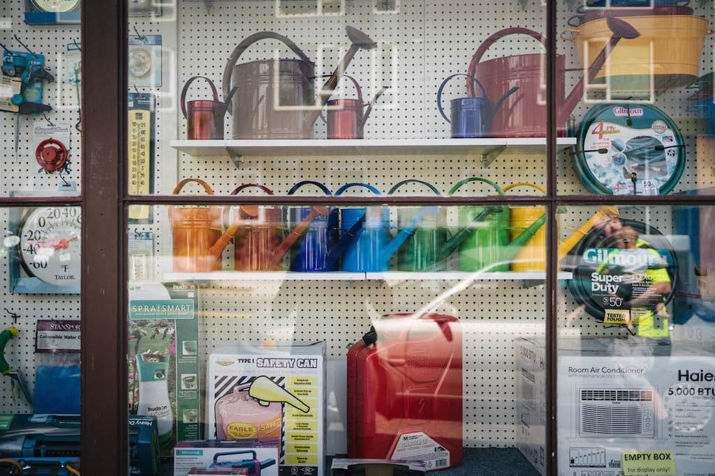 Colorful garden equipment in a shop window