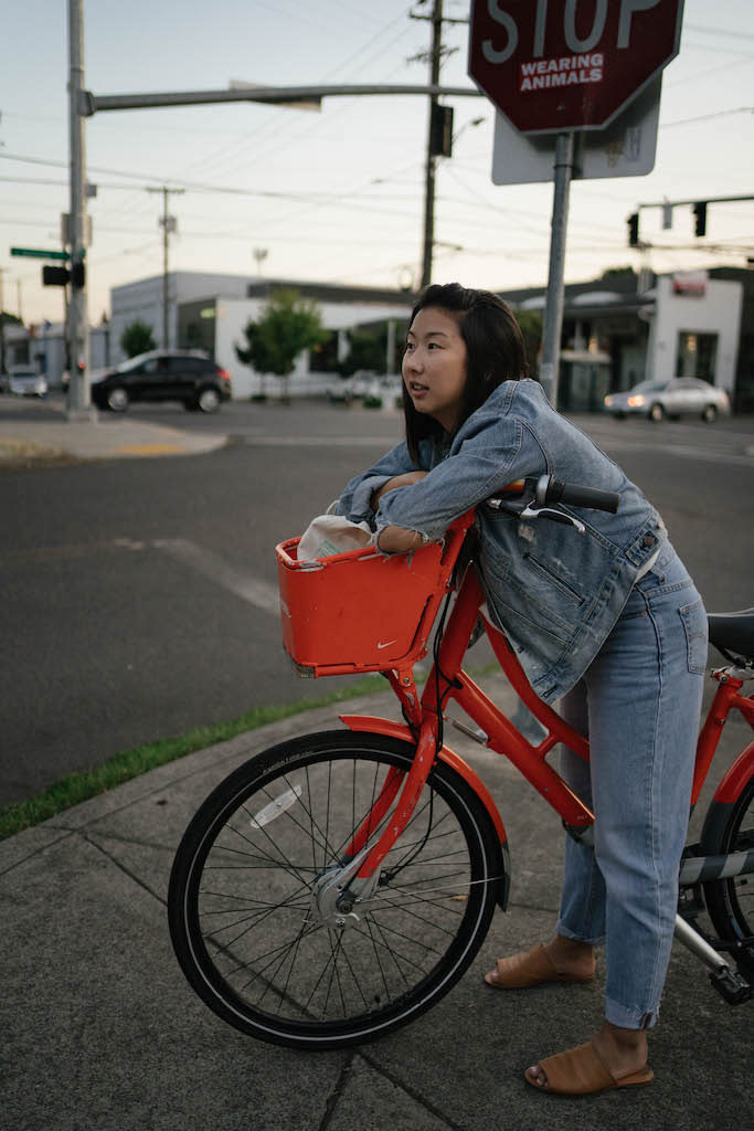 Sara on a red bike