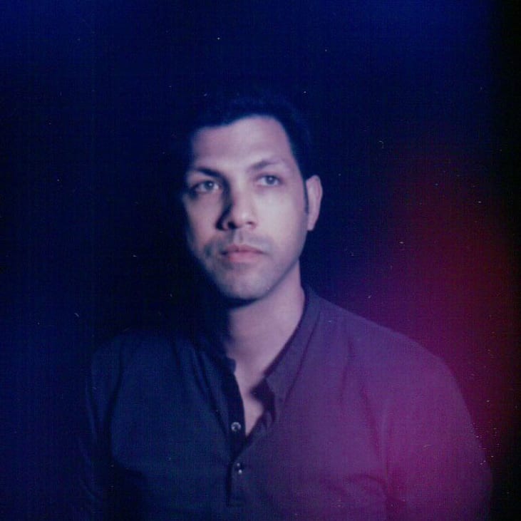 Alex with purple old time lighting