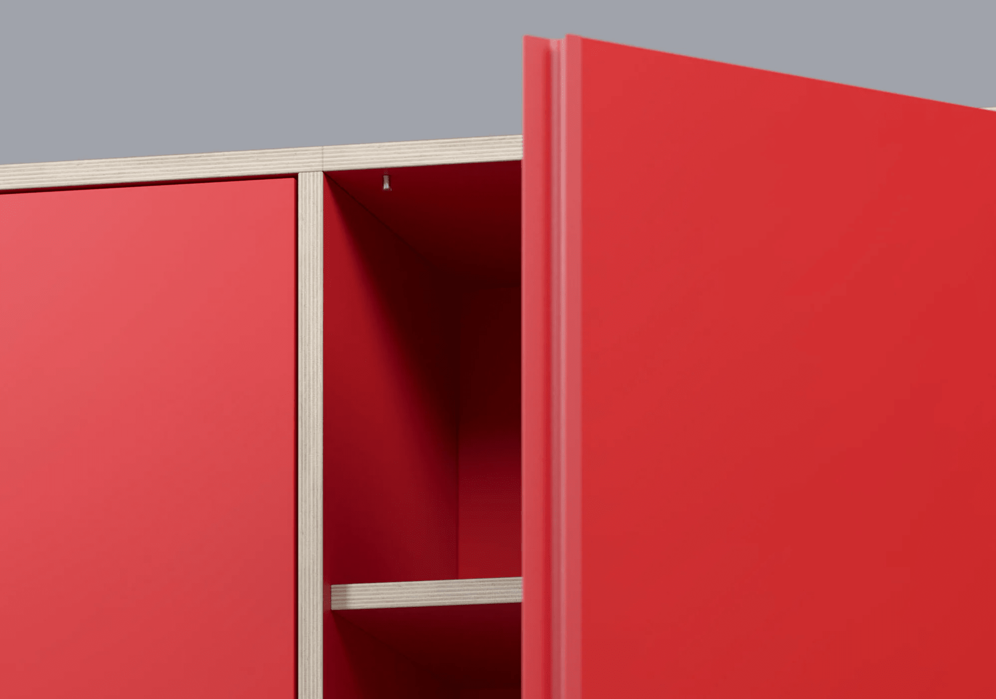 Bücherregal in Rot mit Türen und Schubladen 6