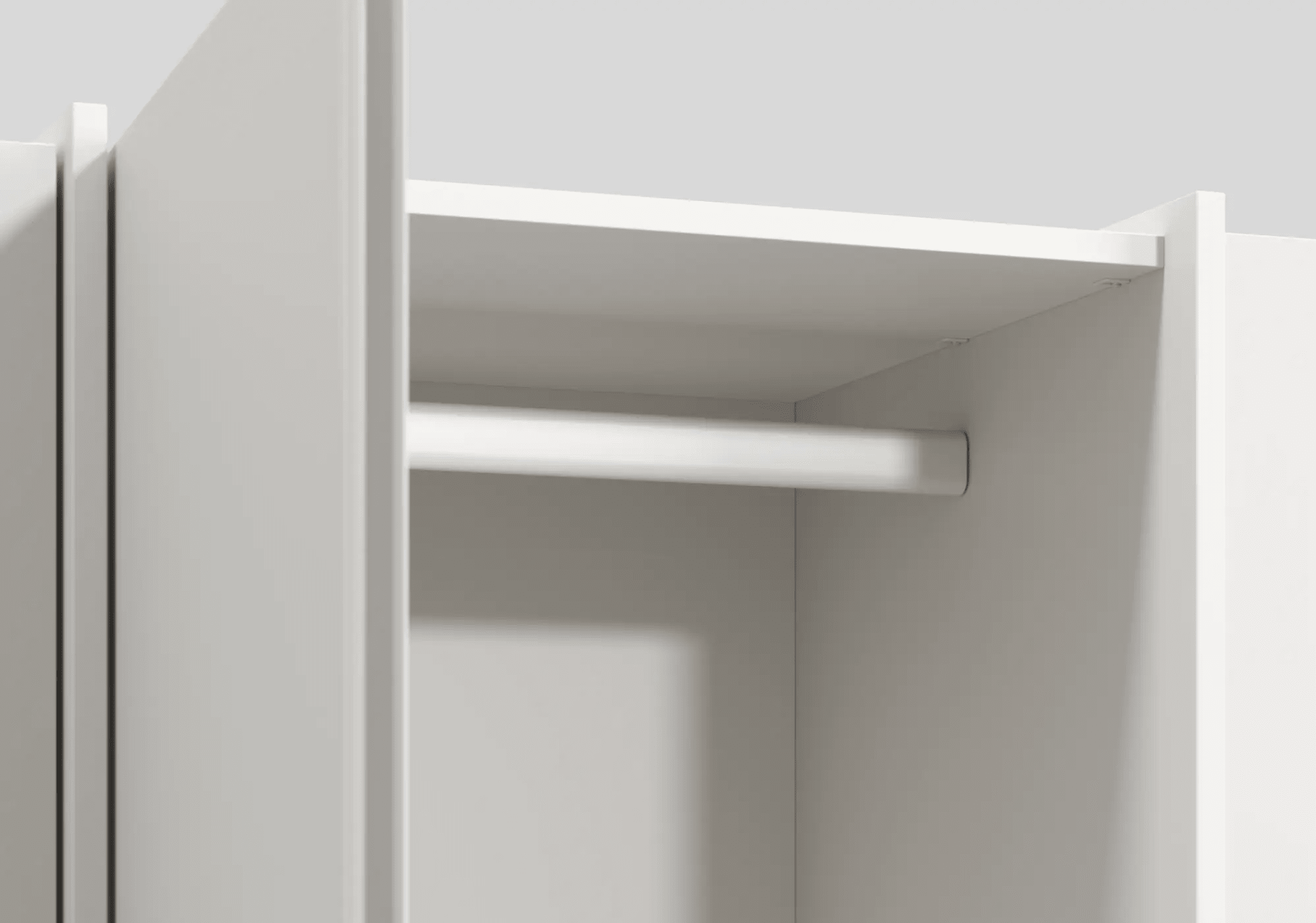 Biały szafa z szufladami wewnętrznymi oraz drążkiem 5