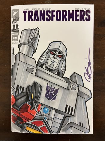 Image of Original Megatron and Laserbeak on a Purple Foil Variant Blank Cover