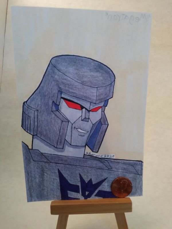Image for megatron postcard head shot