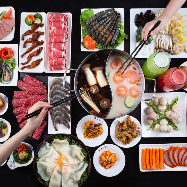 Globally renown hot pot restaurant steams up Houston’s Chinatown Site