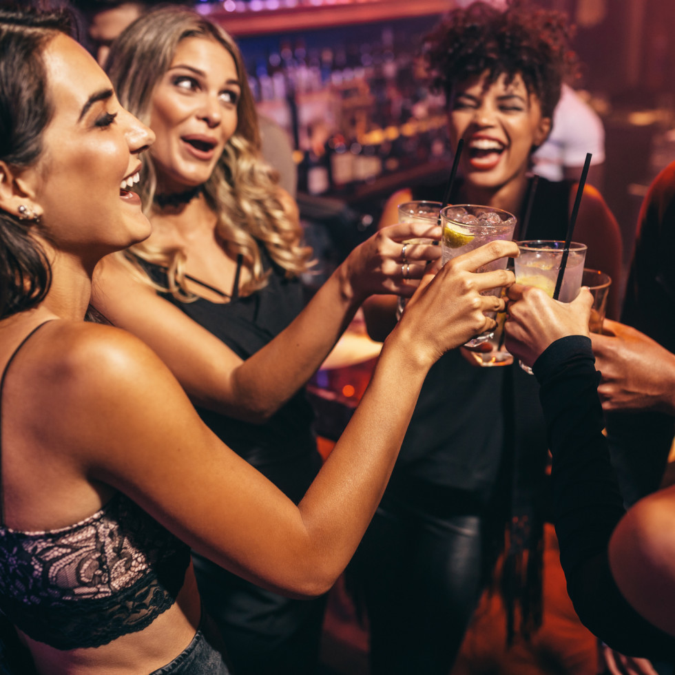 Women toasting in bar