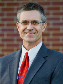 Dr. Allan Stam