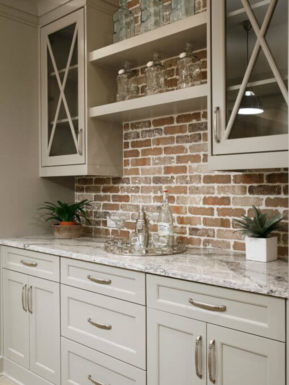 Built-in bar with brick wall