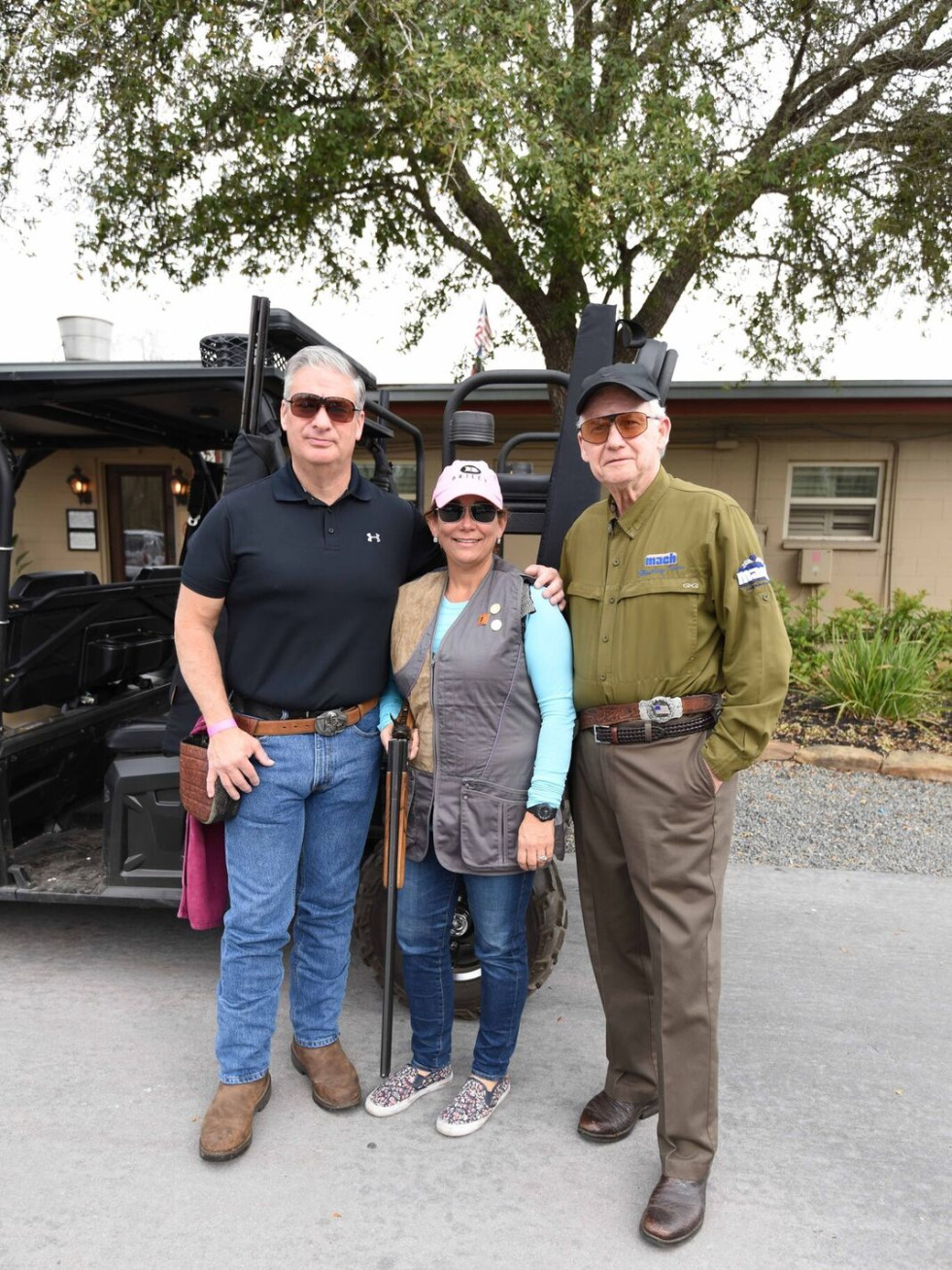 Butch Mach, Carmen Mach, Harry Mach at Memorial Hermann Clay shoot