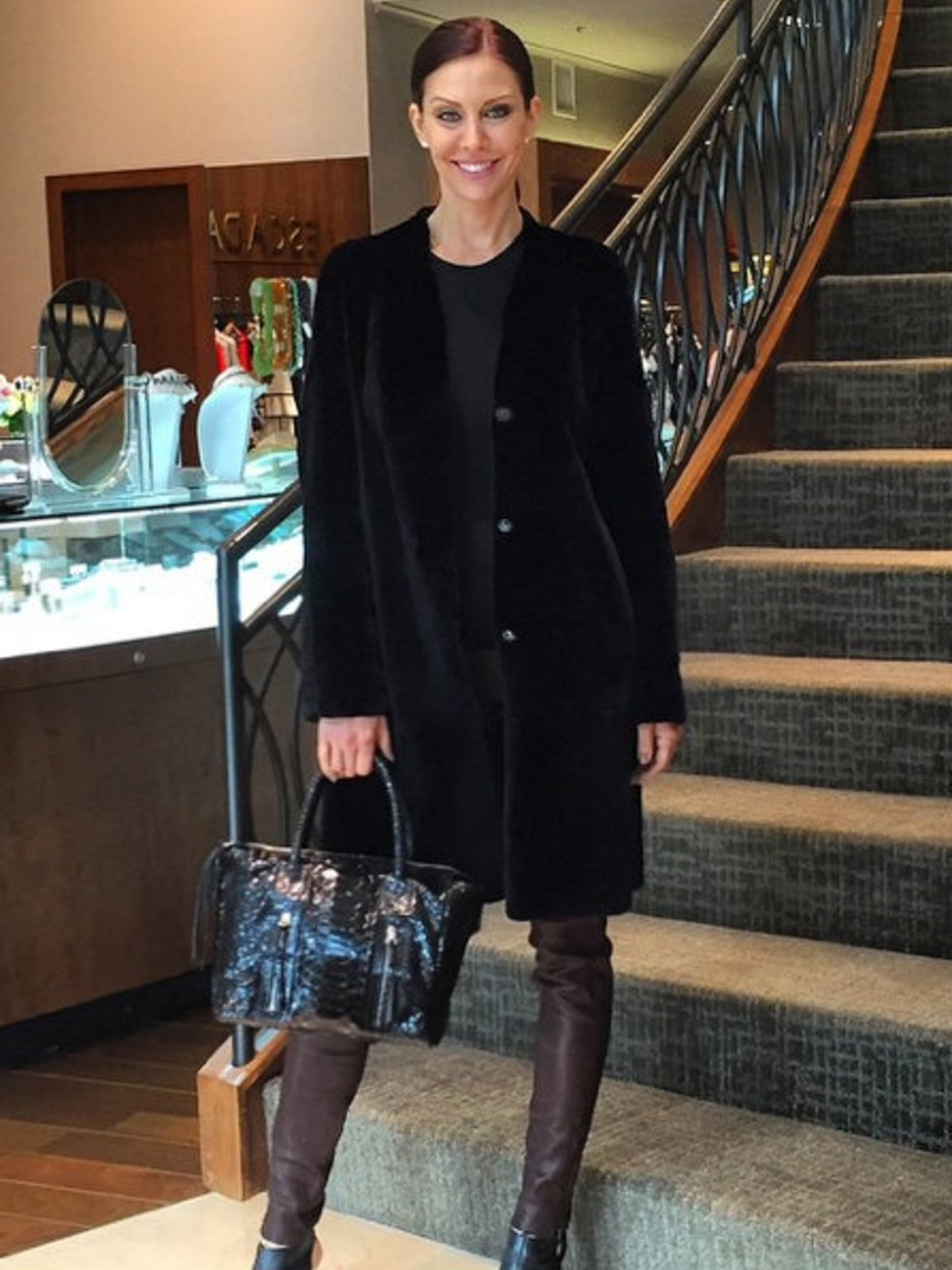 Model in outfit and Carlos Falchi handbag at Elizabeth Anthony