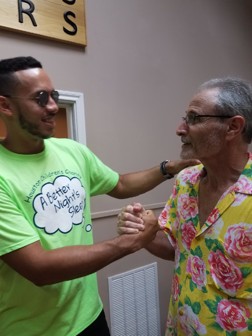 Carlos Correa at bed distribution at Texas Mattress Makers for the Houston Children’s Charity with Youval Meicler