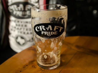 Craft Pride beer brew empty glass Austin bar Rainey Street