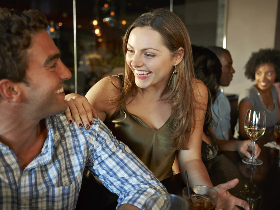 Couple enjoying drinks