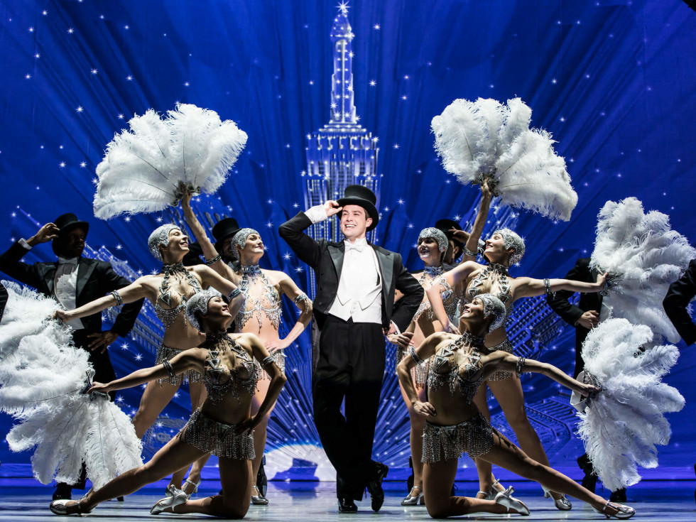 Nick Spangler and the touring cast of An American in Paris