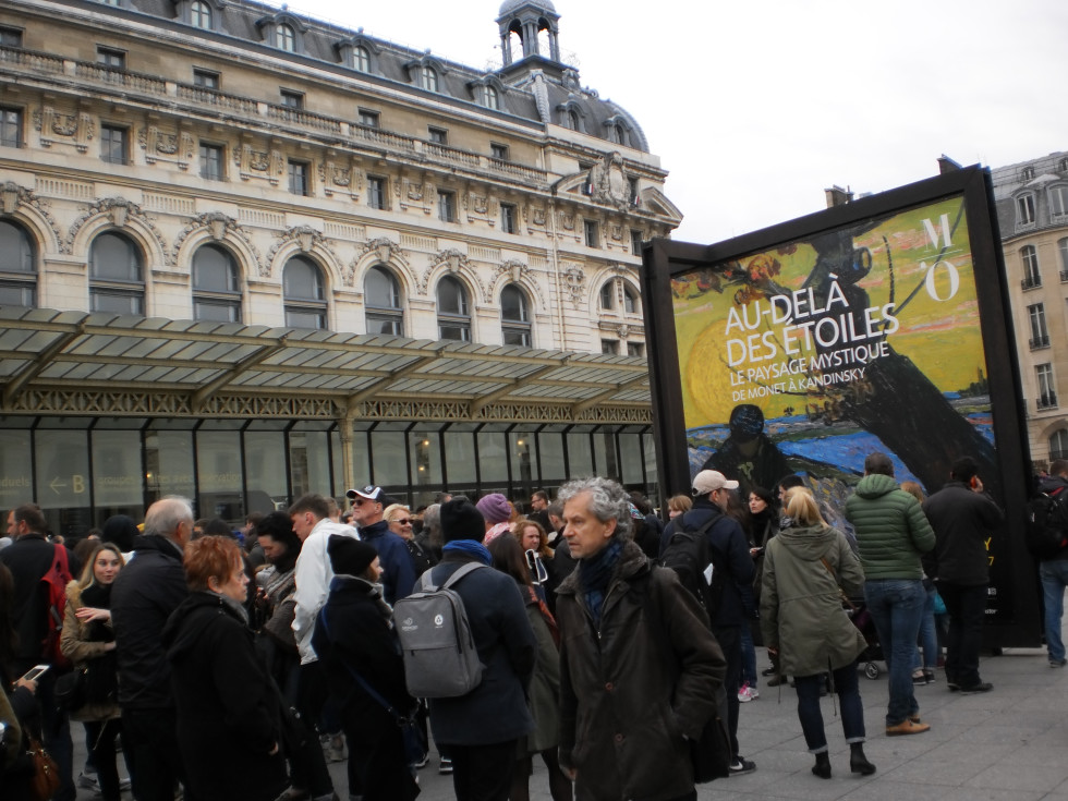 Crowds in line for tickets to "Beyond the Stars, the Mystical Landscape from Monet to Kandinsky" at Musee d'Orsay in Paris