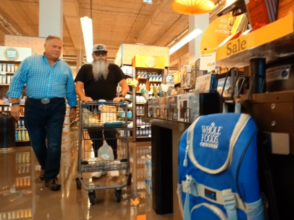 Jim Mills and Lee Ellis of State Fare Kitchen and Bar shop at Whole Foods