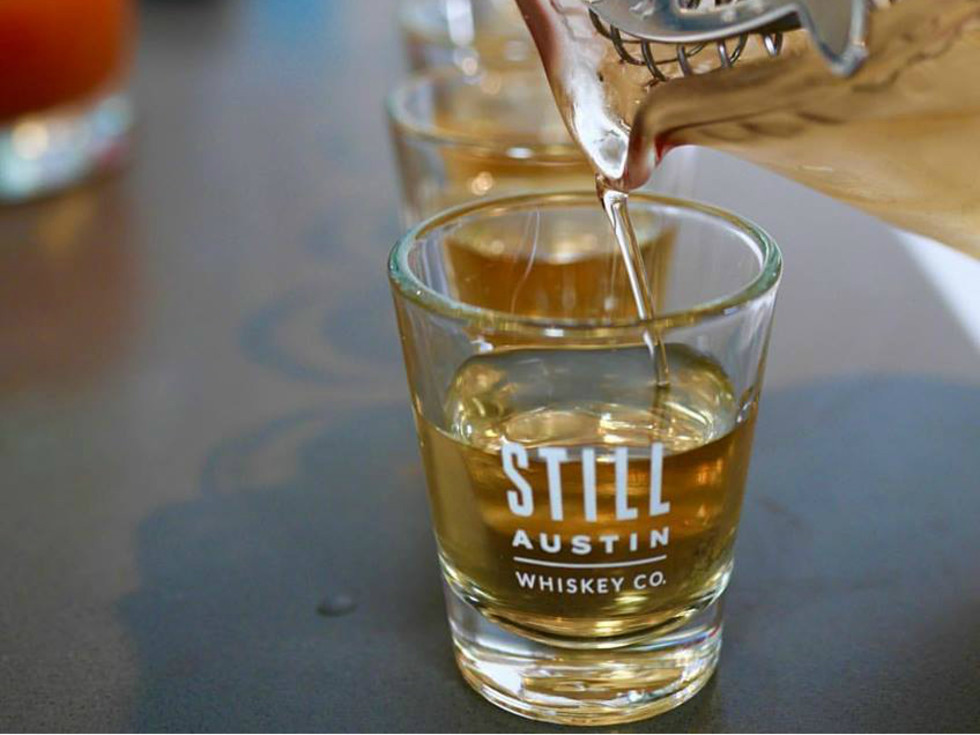 Still Austin Whiskey being poured