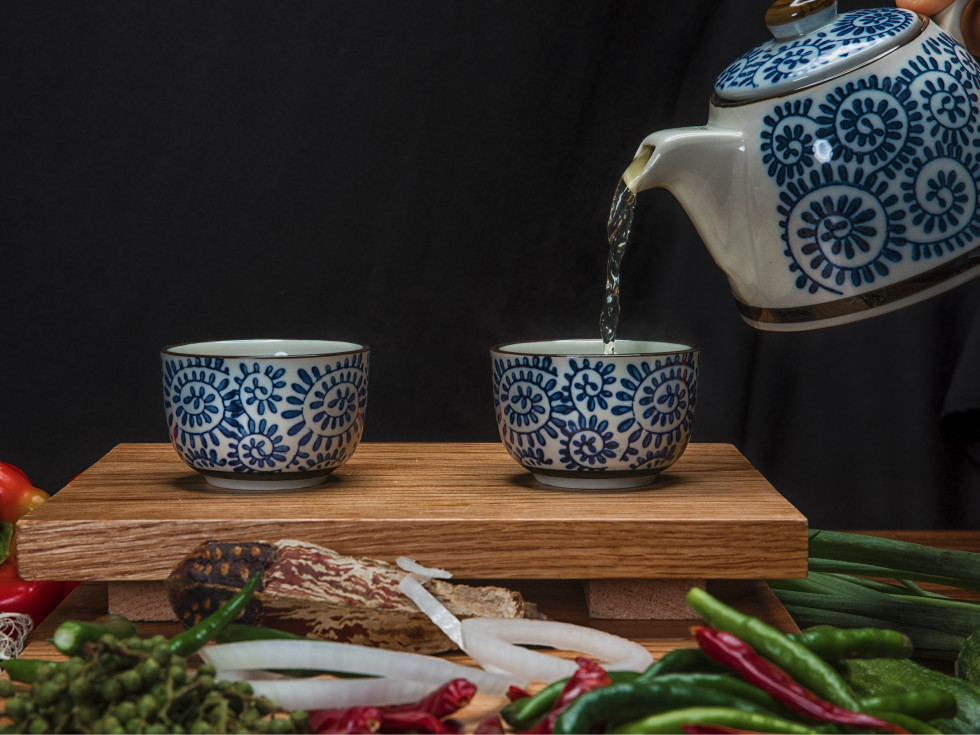 Tea being poured at Pepper Twins