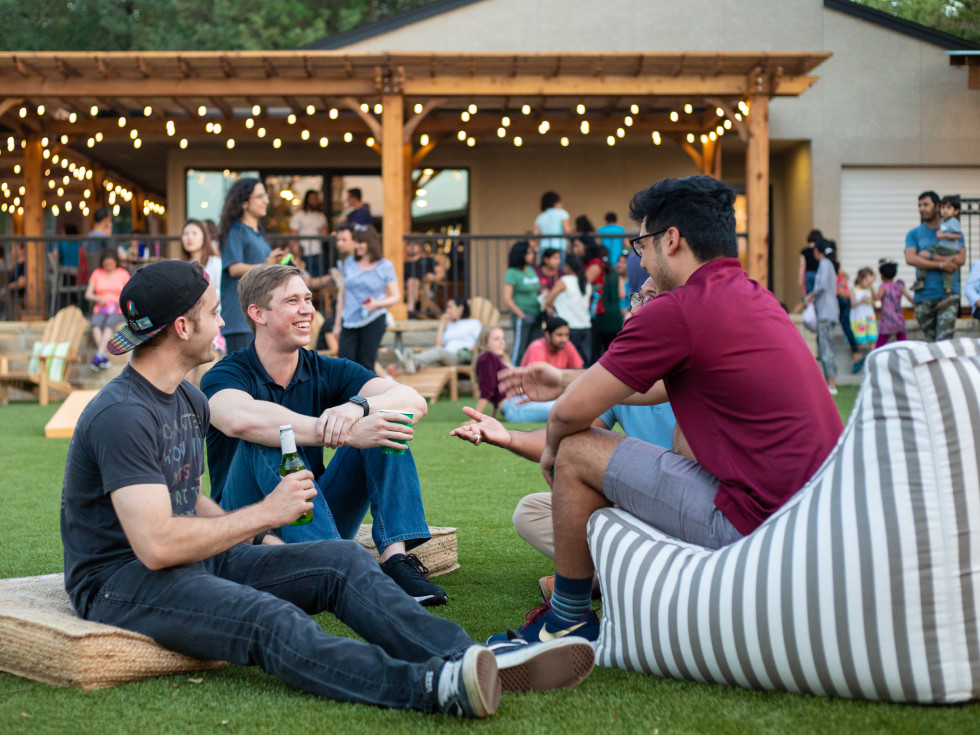 People relaxing on a lawn