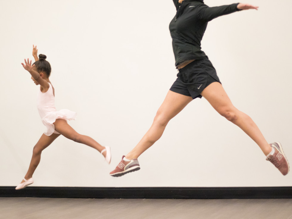 Little girl and woman dancing ballet