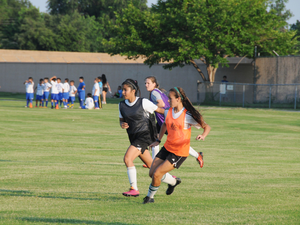 Girls playing soccer