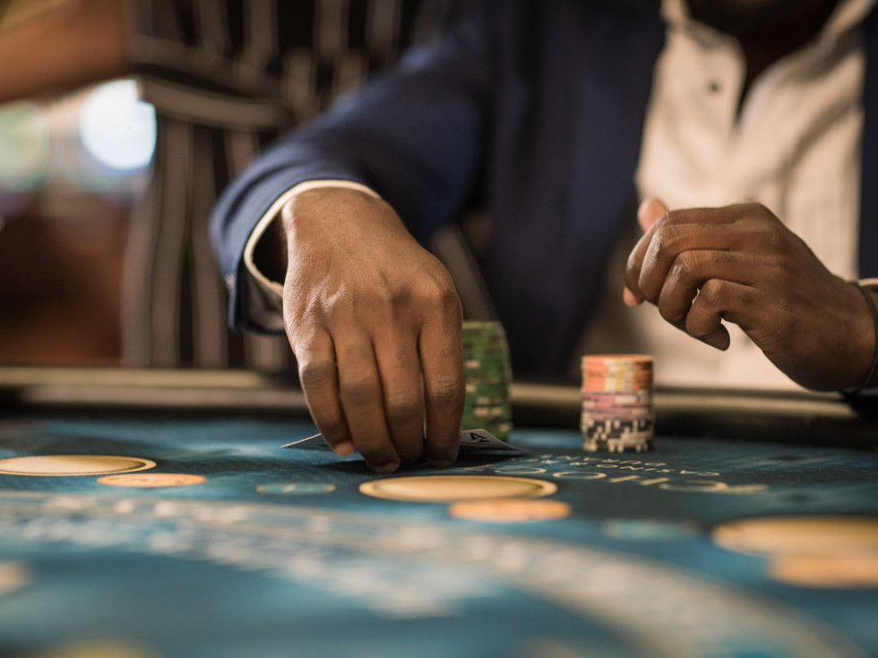 Man playing cards at a casino