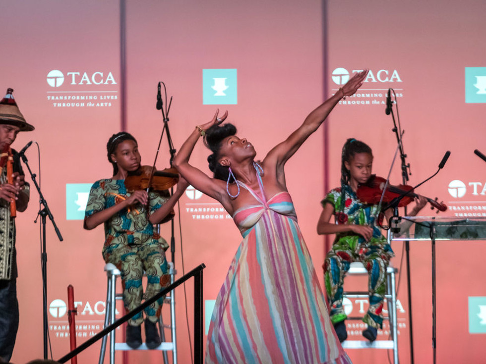 Performance of “Dallas: A Glimpse of Our Soul” by Will Richey and Friends (From left): S-Ankh Rasa, Indigenous American Drone Flute; Aissatouu and Kaira Rasa, Violinists; Iv Amenti, Movement