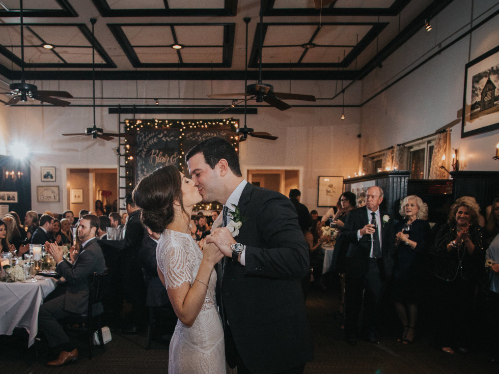 Newlyweds kissing