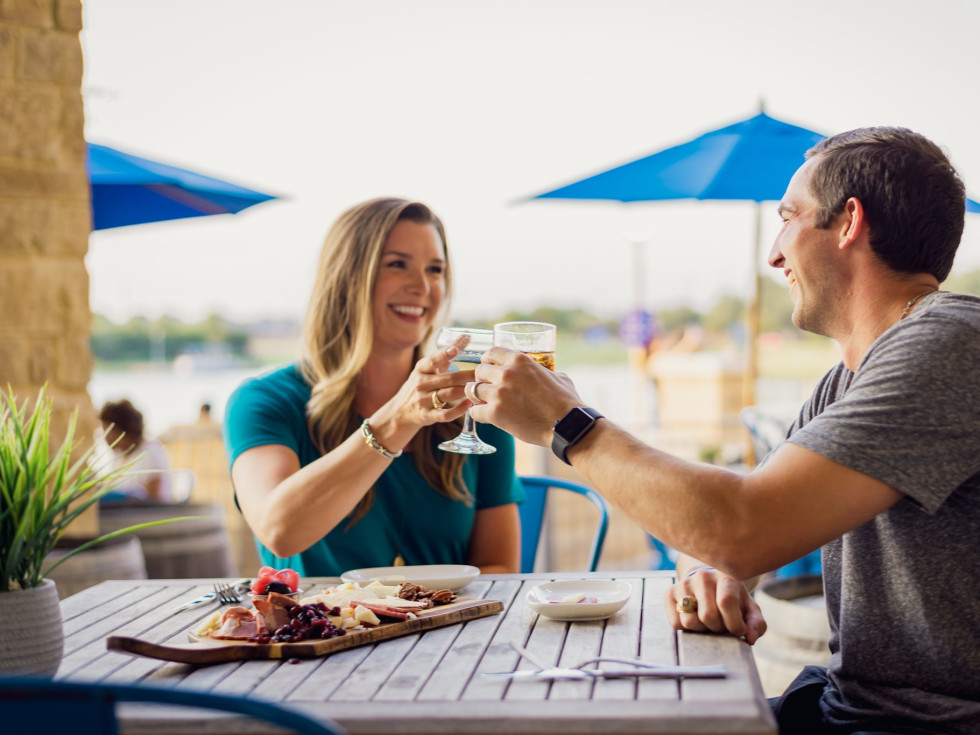 Couple dining at Flying Vine at The Boardwalk at Towne Lake