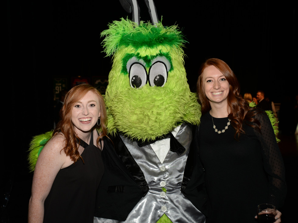 Cassidy Clark and Sydney Bedford with Stars mascot Victor E. Green