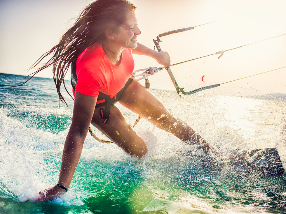 Woman kite boarding