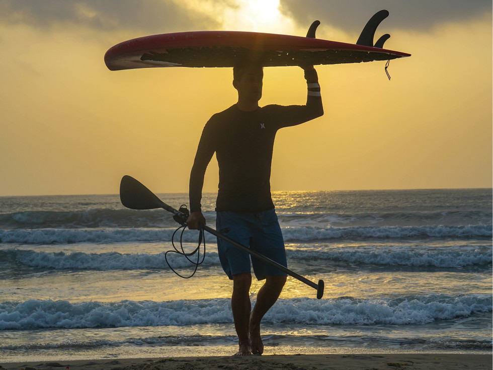 Surfer at sunset