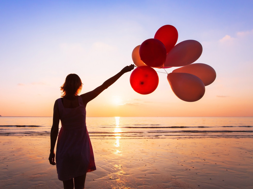balloon beach release woman galveston 