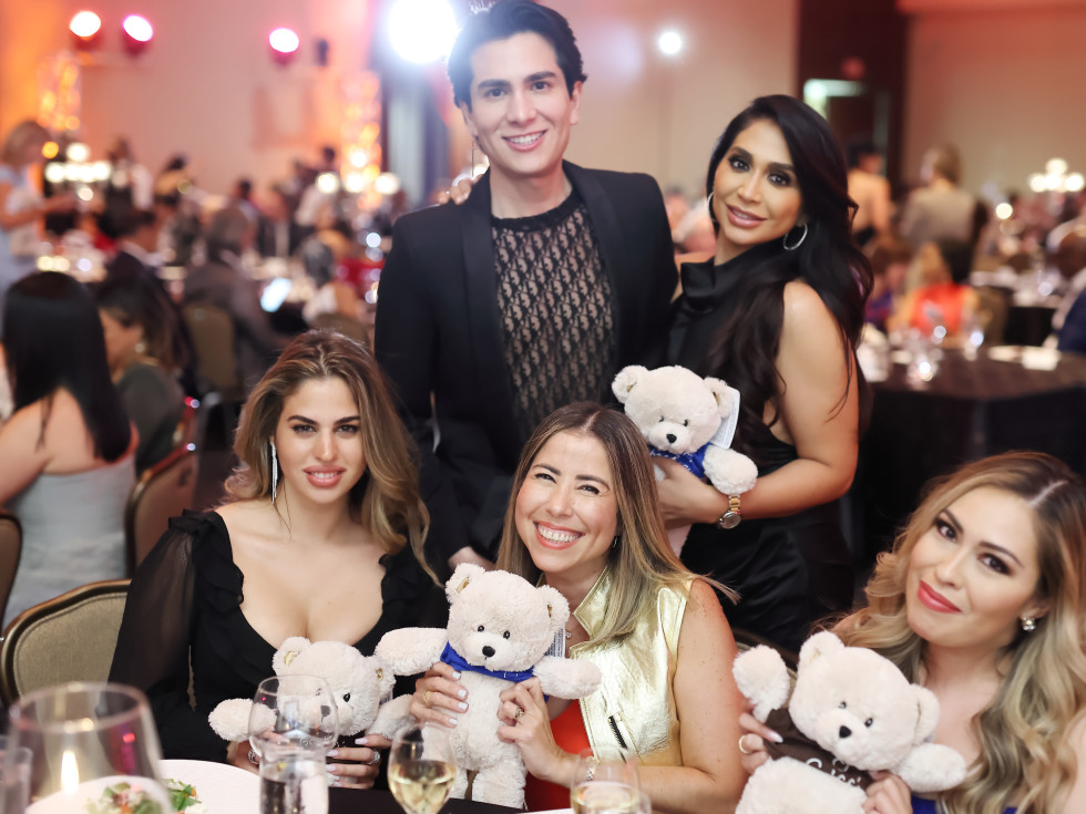 Operation Smile Gala 2021 Yasmine Kateb (left), Angel Woolsey, and party guests